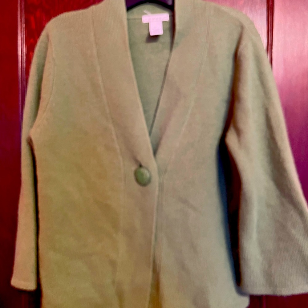 Cute sweater with decorative button; size L.